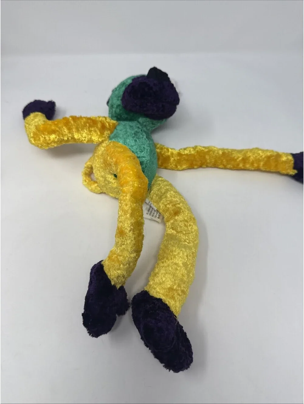 Multi Colored Mardi Gras Monkey Plush